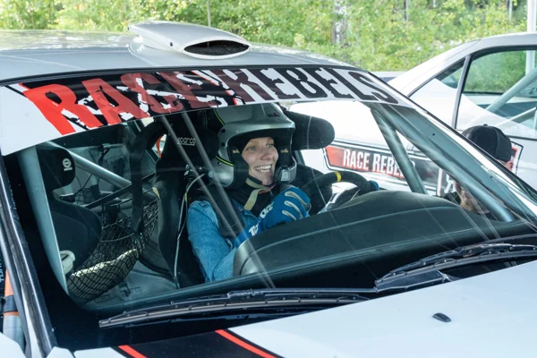 A driver in a rally car